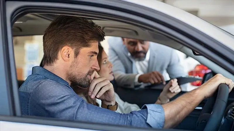 Family taking a vehicle test drive