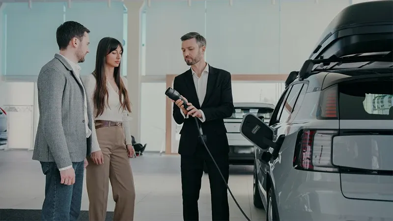 Demonstrating how to use an EV charger