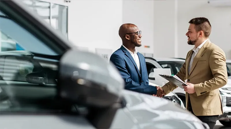 Making a deal in a car showroom
