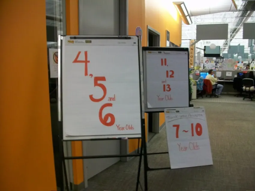 Signs for age groups assigned to each training room during a hurricane
