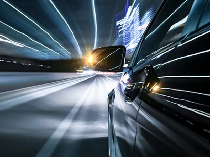 Car being driven on a highway