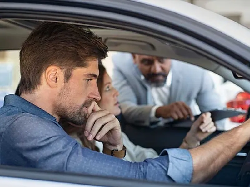 Family taking a vehicle test drive
