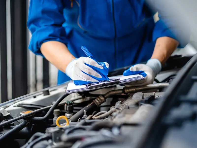 Mechanic working on a car