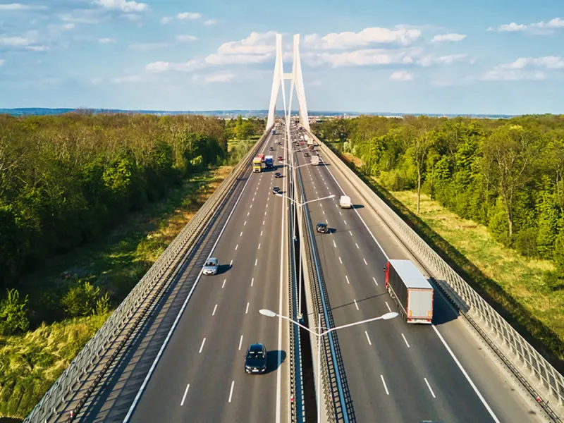 Highway surrounded by forests