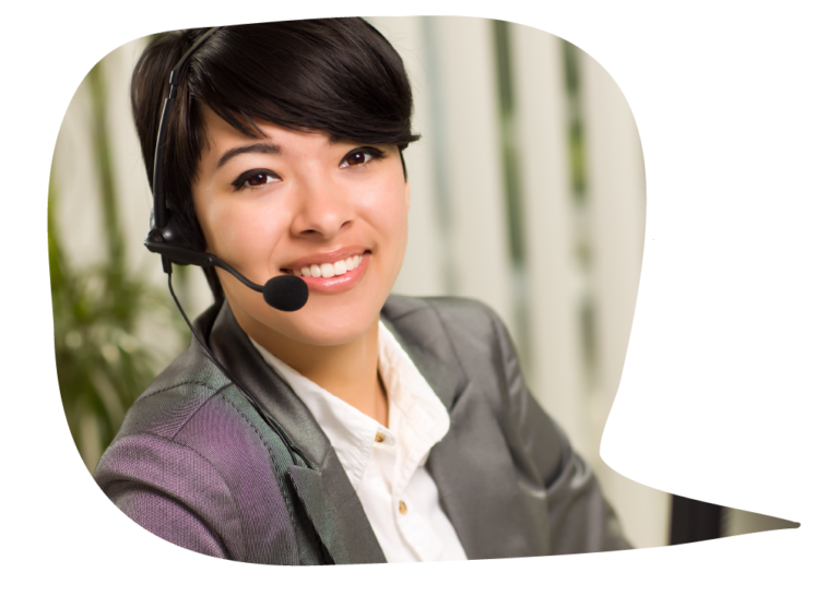 A woman wearing a headset and a business suit is smiling into the camera