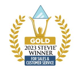 Gold trophy holding up a triangle symbol, surrounded by gold fig leaves. "Gold 2023 Stevie Winner for Sales & Customer Service"
